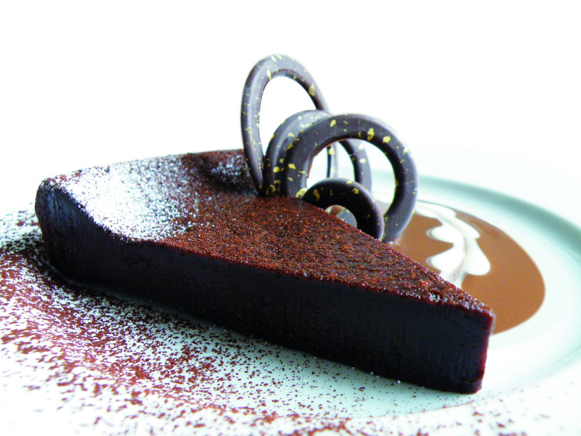 Photo d'une part de gâteau au chocolat pour illustration de la société Naturellement Gourmand